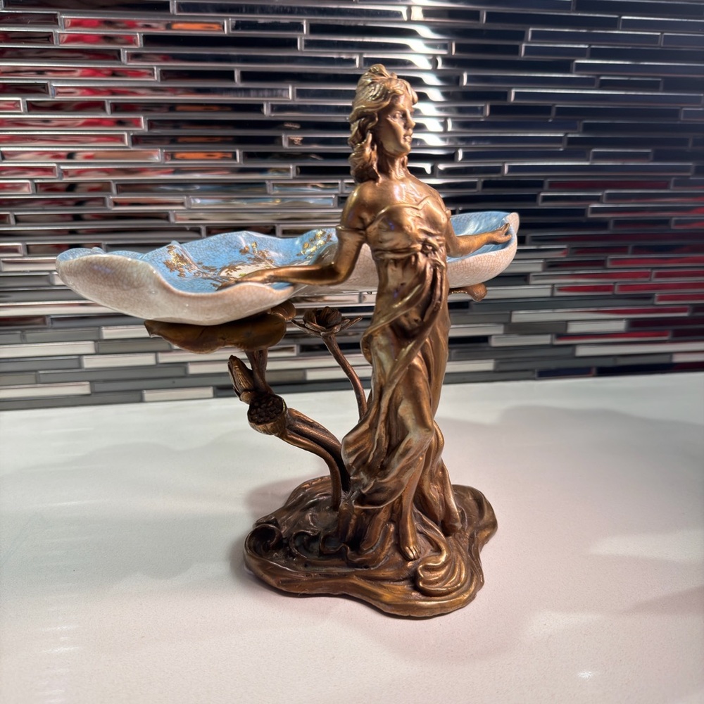 Elegant Bronze Figurine with Blue Accents
